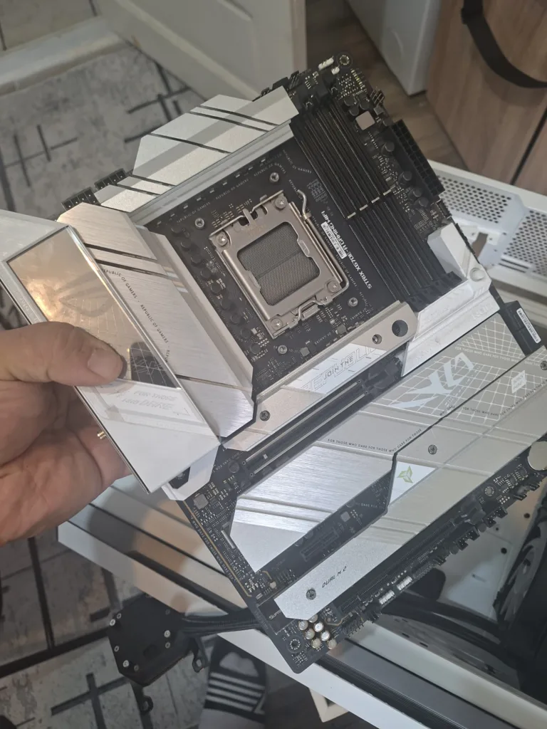 Motherboard disassembled for replacement and AM5 platform verification