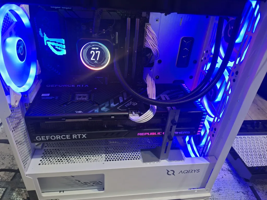 Gaming PC powered on after reassembly and maintenance